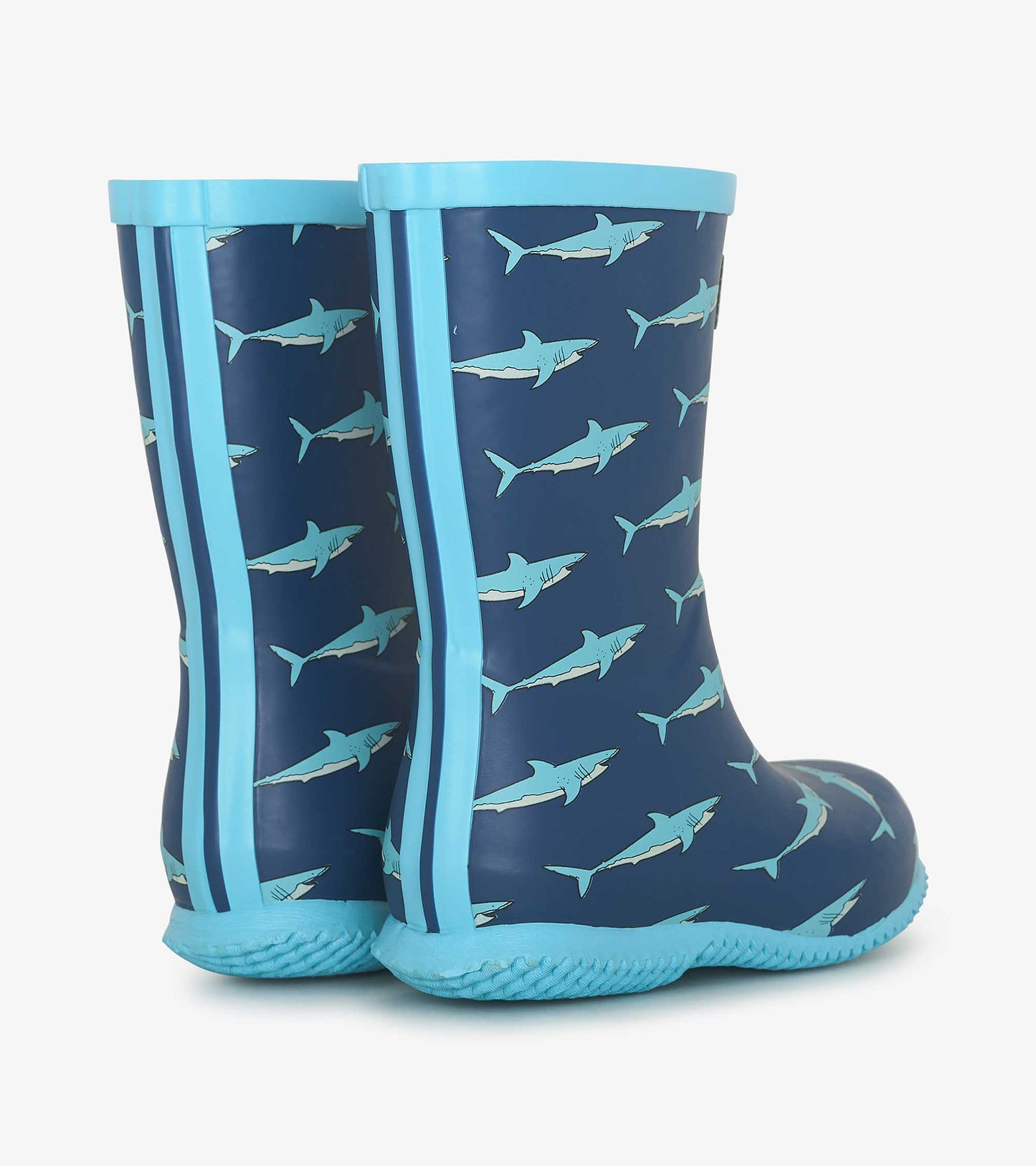 Blue waterproof wellies featuring a shark pattern and light blue accents, designed for kids.