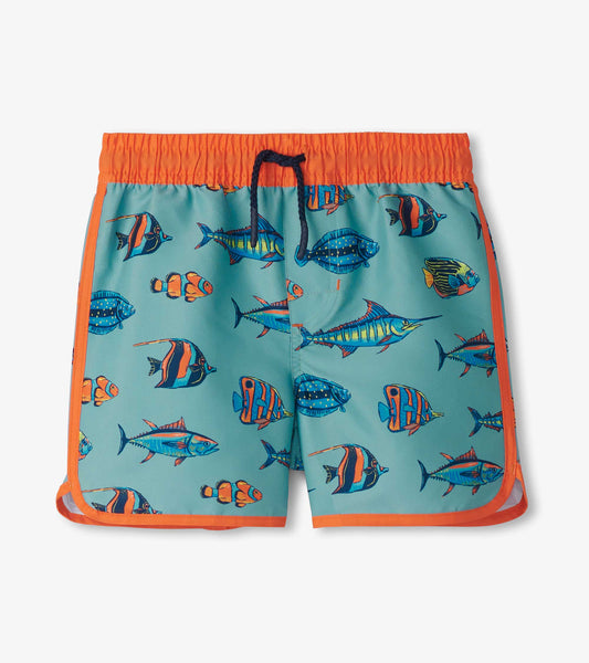 Turquoise swim shorts featuring colorful tropical fish patterns and an elastic waistband with an orange drawstring.