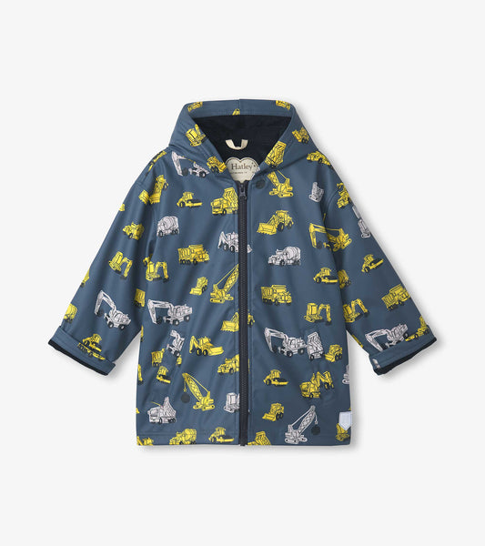 Blue zip-up raincoat featuring yellow construction vehicle patterns, designed for boys with a hood and long sleeves.