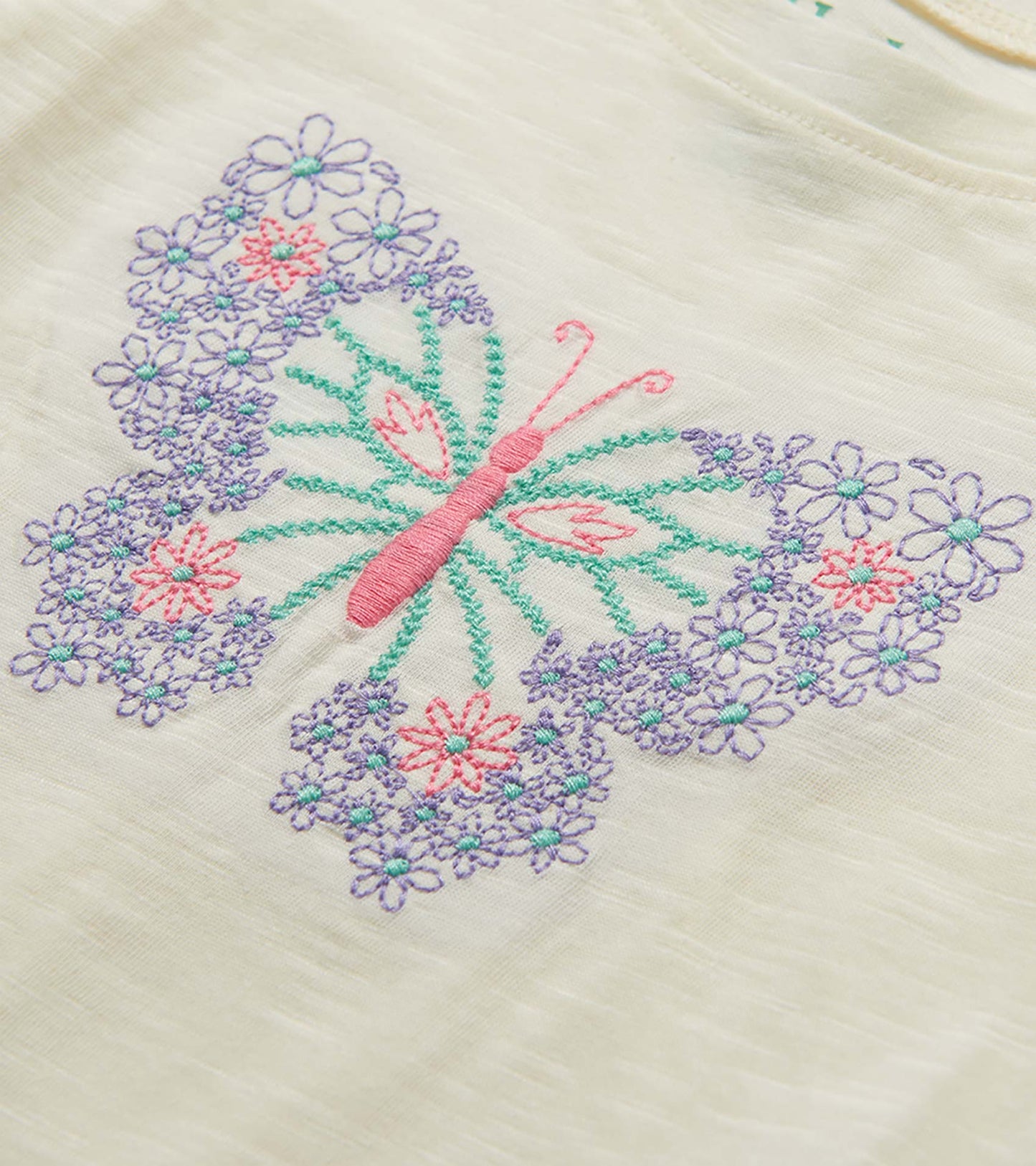 Cream toddler T-shirt with embroidered pink butterfly and purple floral design