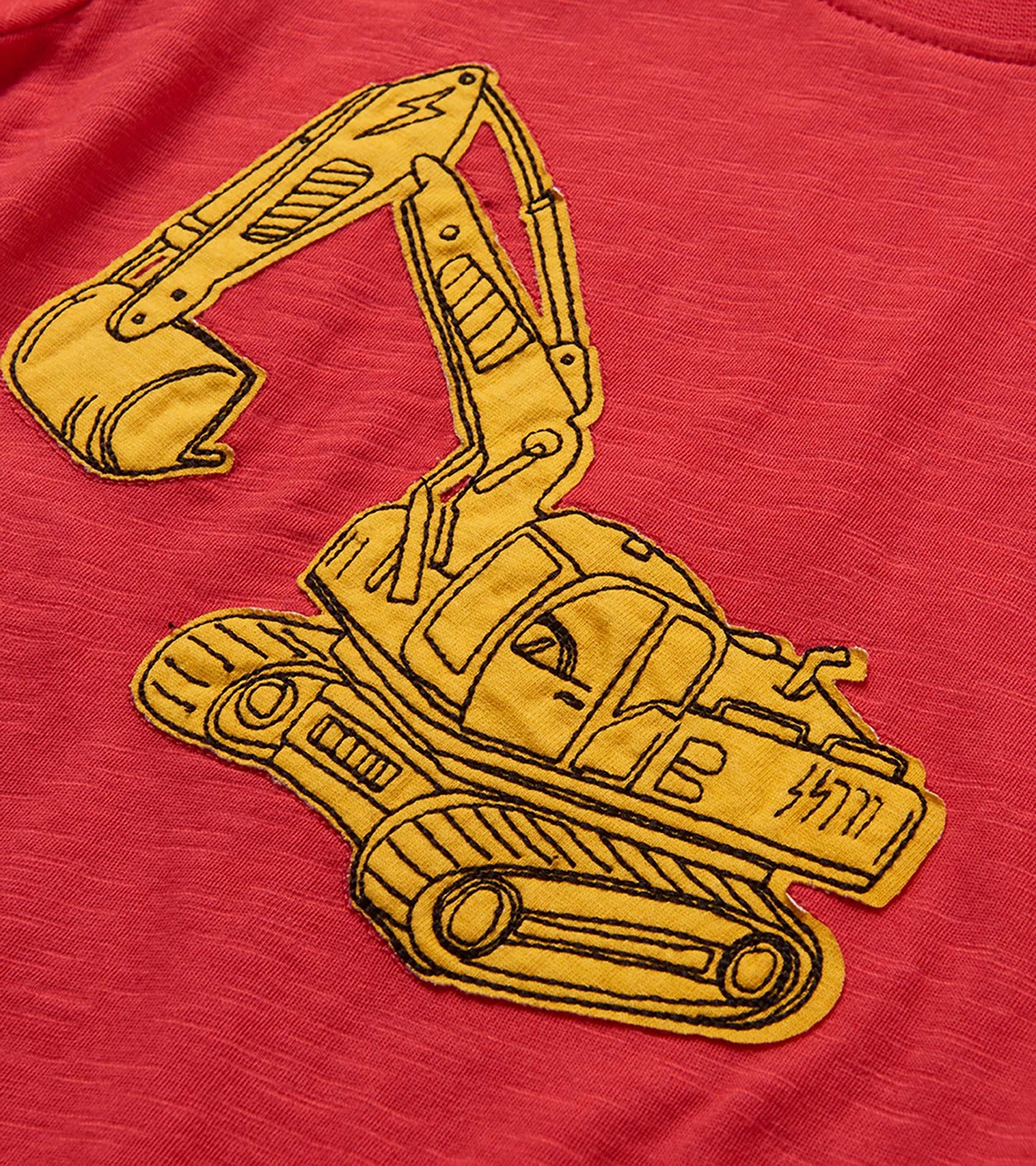 Red T-shirt with yellow excavator graphic print, close-up front view