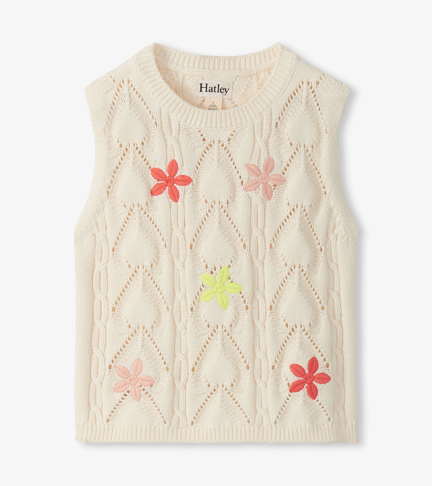 Cream sleeveless crochet knit top with diamond openwork and pink, coral, and lime flower appliqués