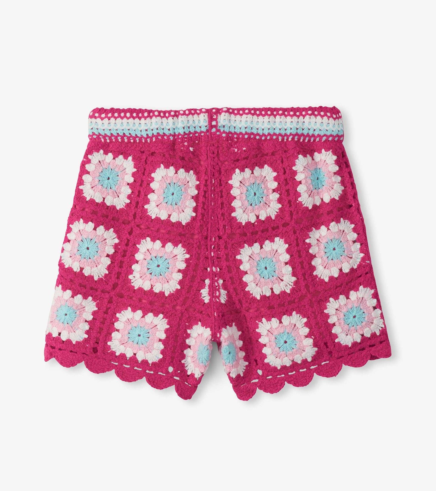 Pink crochet shorts with white, light blue, and pale pink floral pattern and scalloped hem, front view