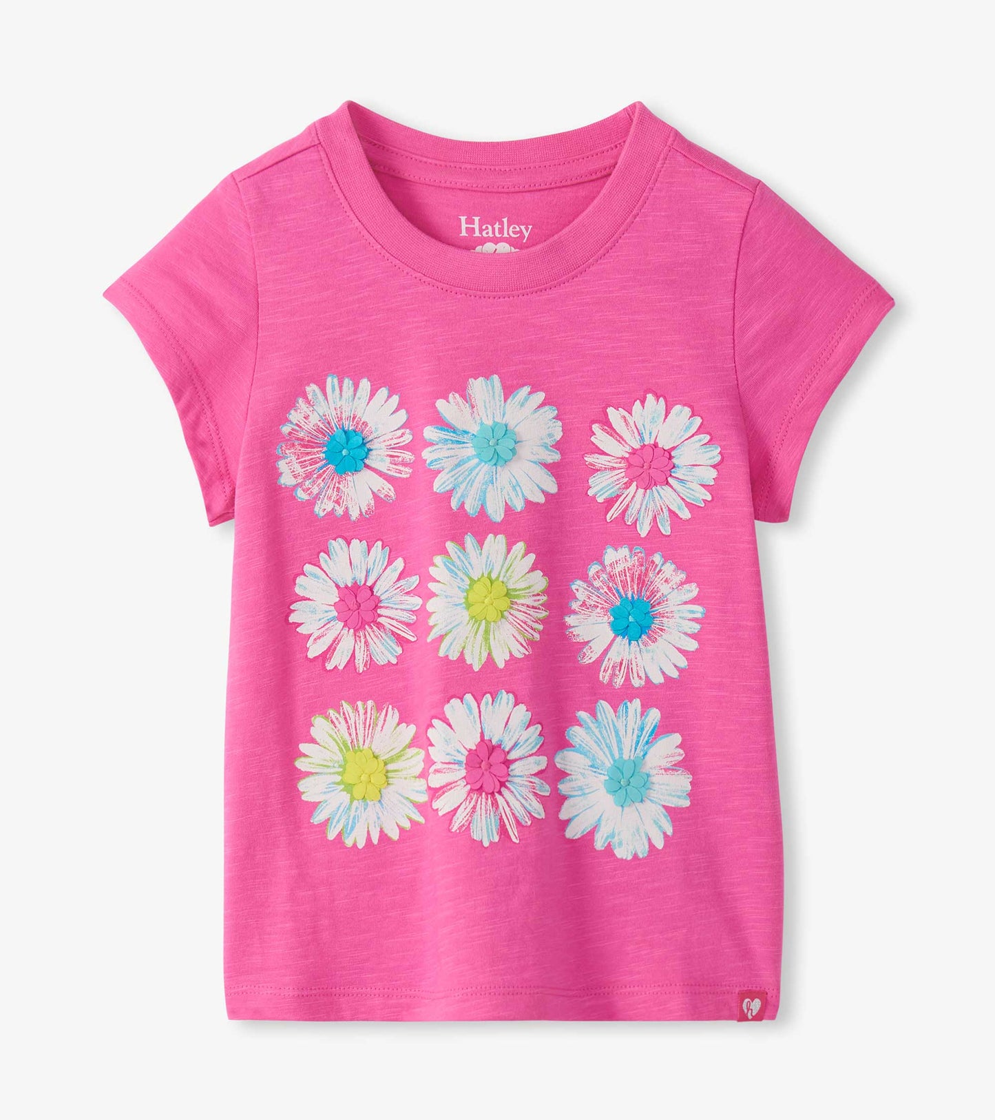 Bright pink girls crew neck tee with nine white daisy graphics and colorful flower centers, front view