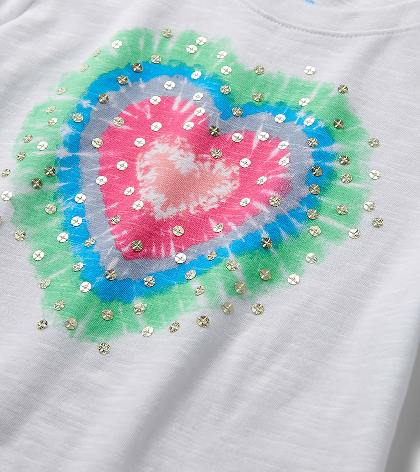 White girls' tee with colorful heart burst graphic and gold sequins, front view close-up
