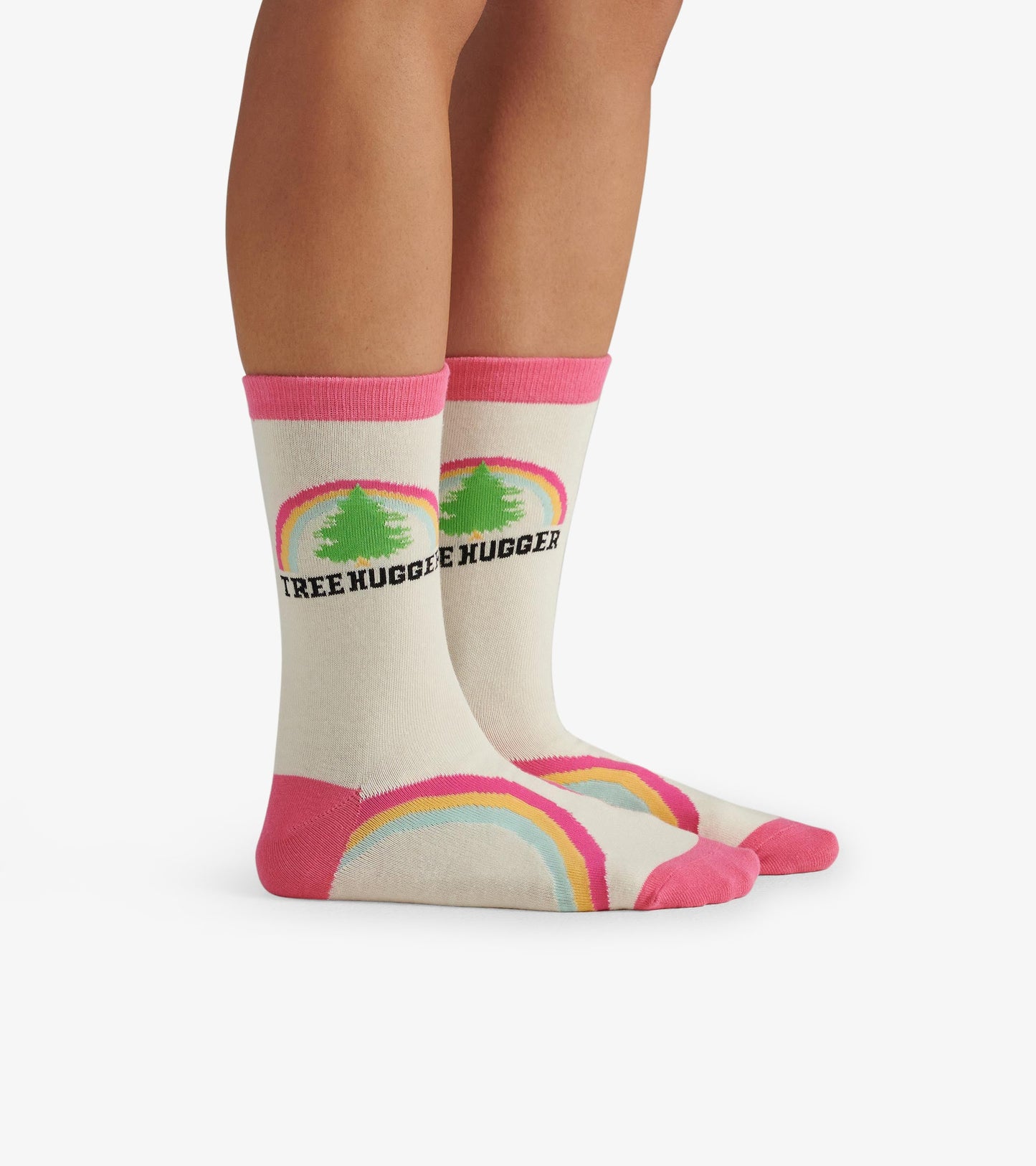 Cream-colored crew socks with pink accents, featuring a tree graphic and "TREE HUGGER" text, ideal for casual wear.