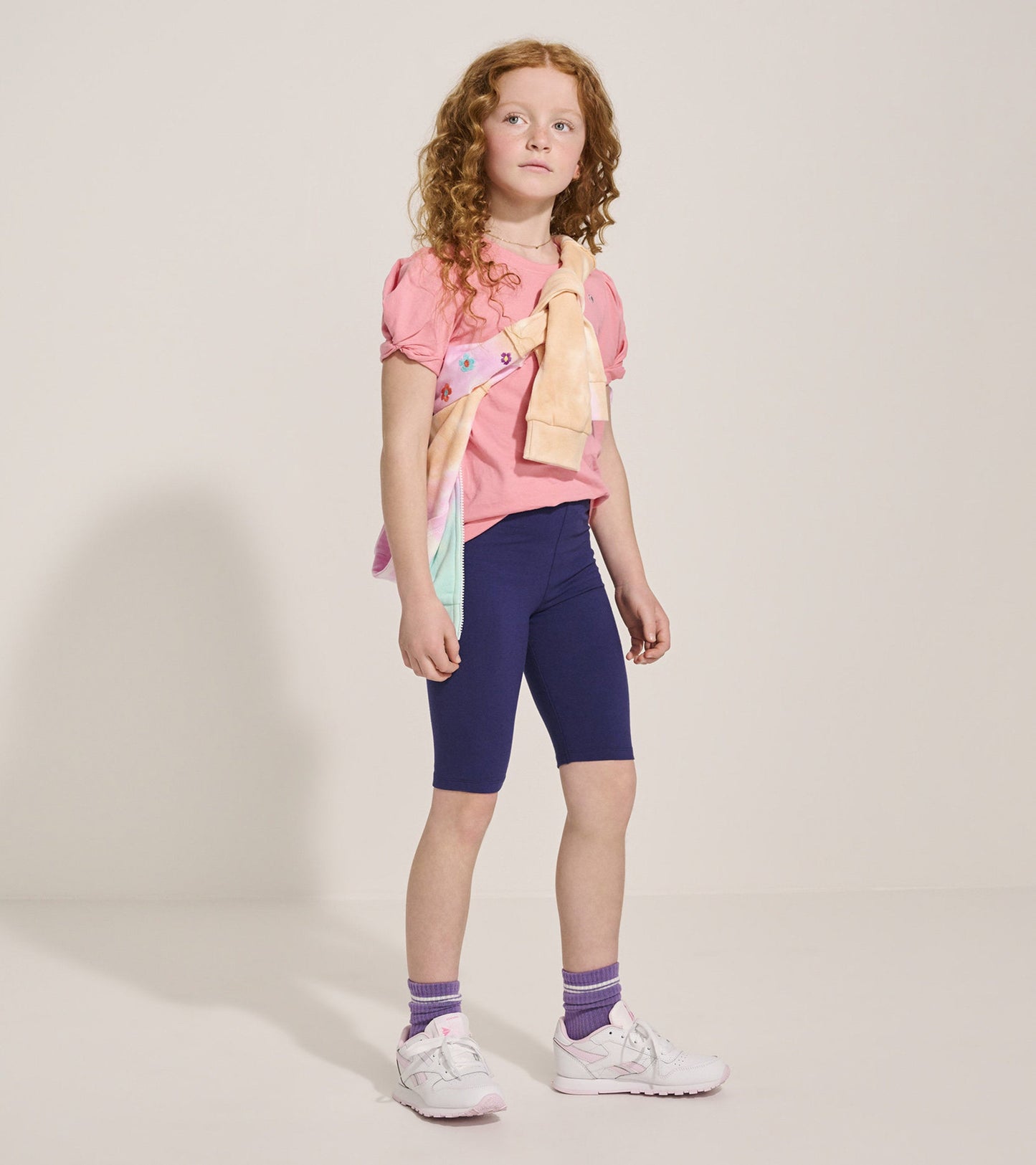 Navy bike shorts for girls, made from stretchy material, designed for comfort and active wear.