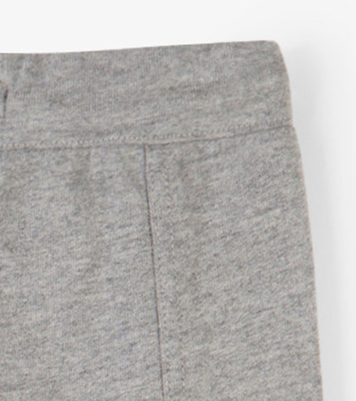 Grey cargo joggers with a soft texture, featuring an elastic waistband and side pockets.