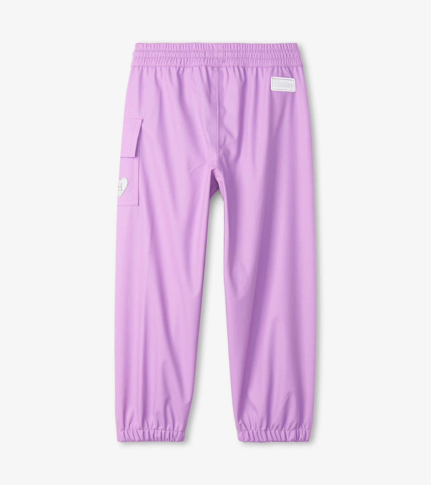 Lilac waterproof kids' rain pants with elastic waistband and side pocket. Ideal for outdoor play in wet weather.