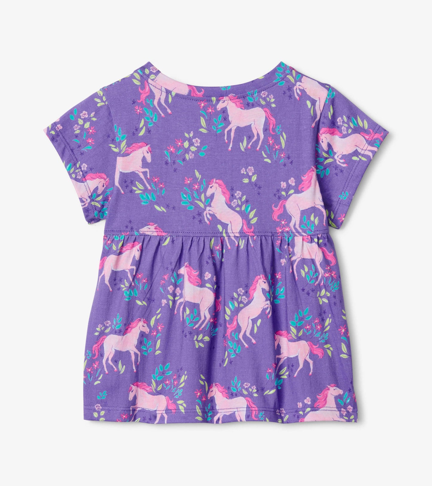 Purple toddler tee featuring a playful unicorn and floral pattern with short sleeves and a gathered waist.