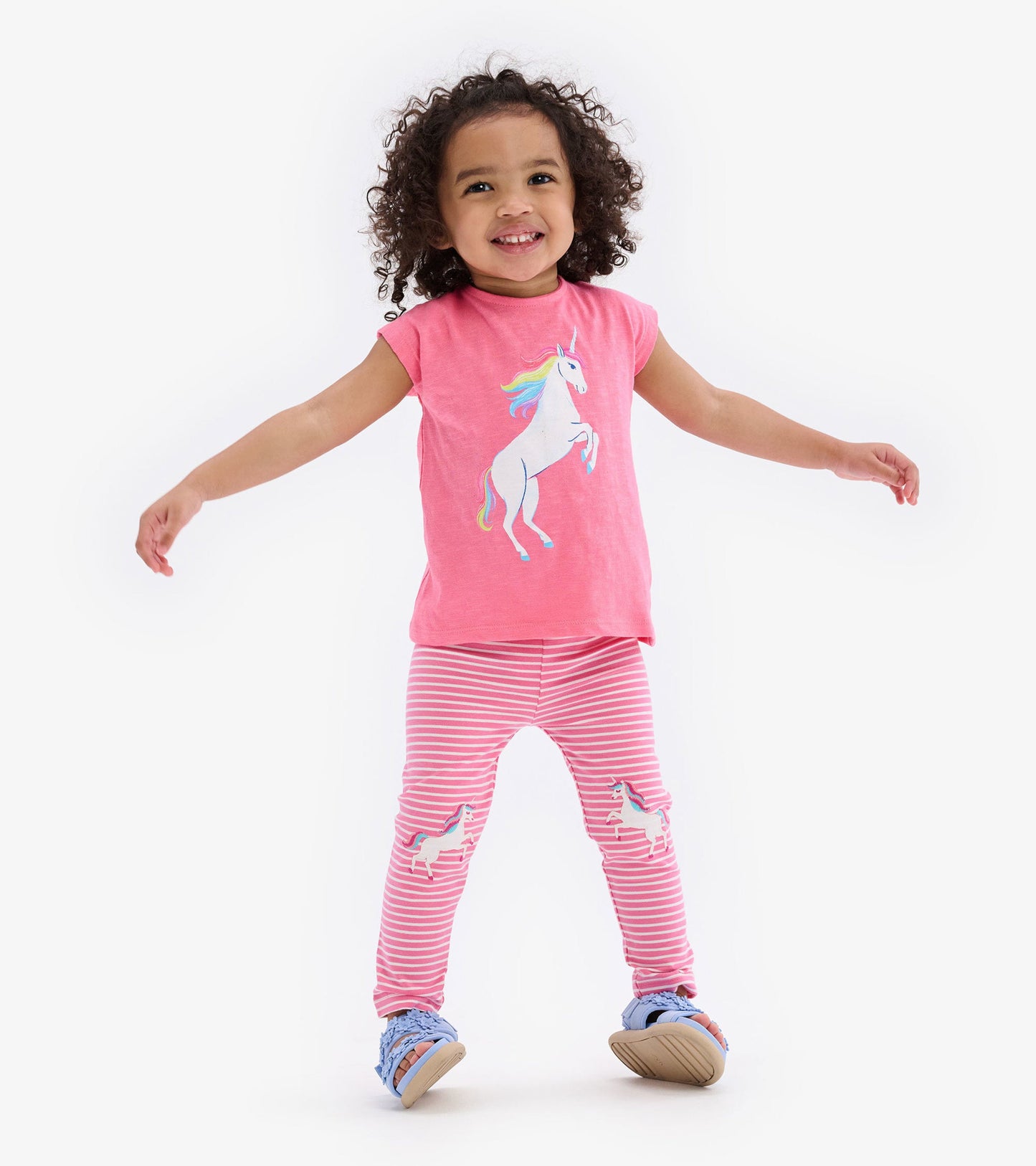 Pink striped toddler leggings featuring unicorn graphics, perfect for casual play.