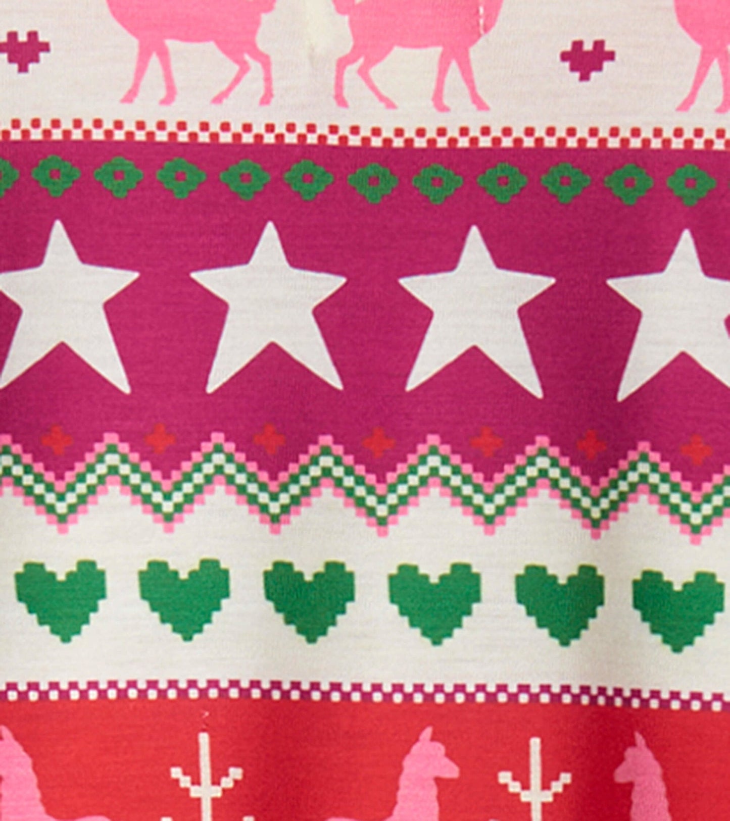 Colorful Fair Isle pattern featuring pink, green, and white hearts, stars, and animals on a soft fabric.