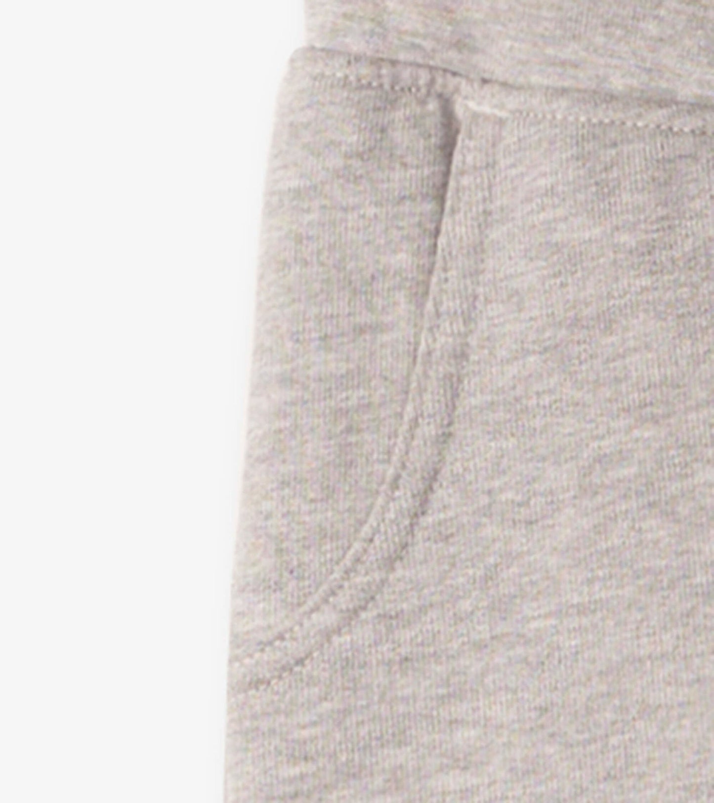 Grey slim fit joggers with a soft texture and side pockets, suitable for athletic activities.