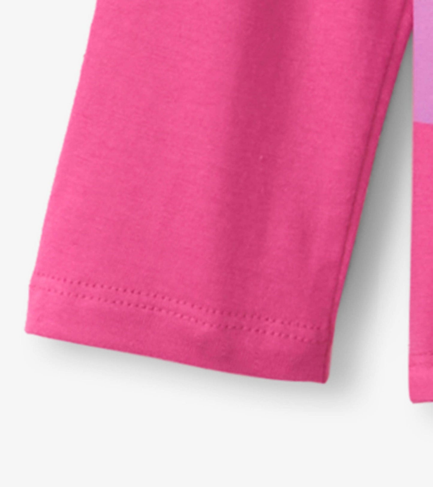 Raspberry long sleeve t-shirt with a soft cotton material, featuring a colorful unicorn design.
