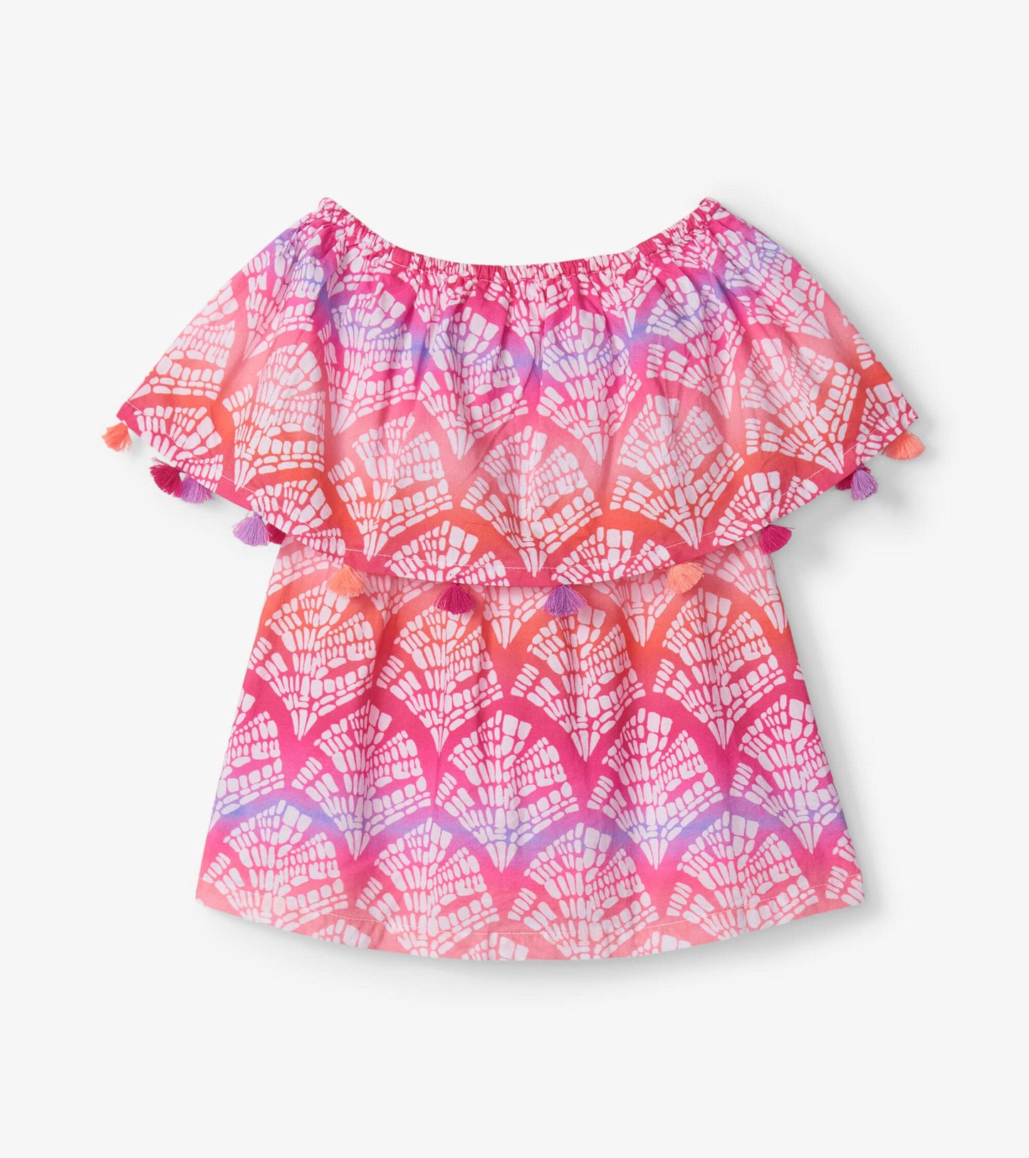 Colorful off-shoulder top featuring a flounce design with a rainbow pattern and decorative tassels.