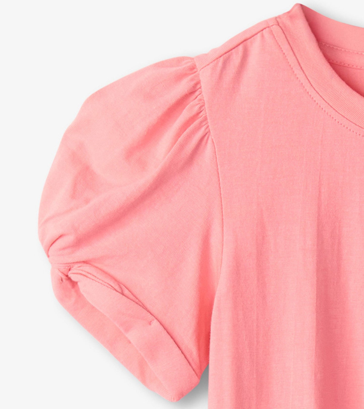 Pink short-sleeve tee with twisted sleeves, made from soft fabric, ideal for casual wear.