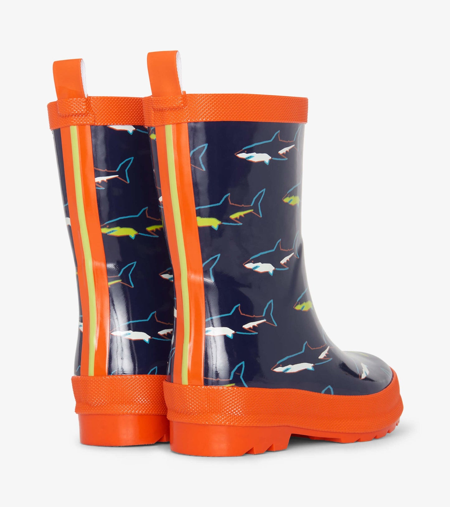 Navy shiny wellies with colorful shark patterns and orange accents, featuring a textured sole and pull tabs for easy wear.