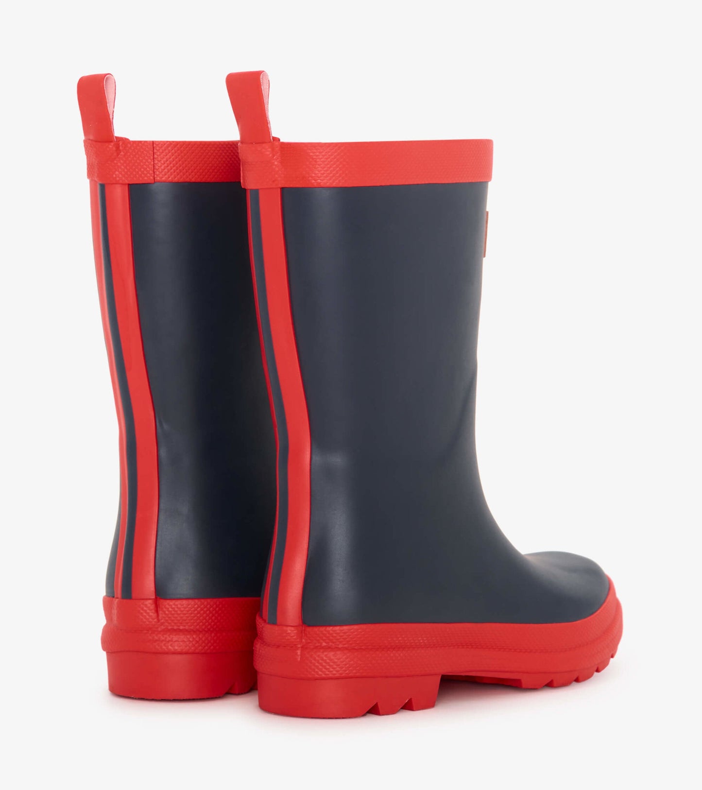 Navy and red matte wellies with a smooth finish and textured sole, featuring pull tabs for easy wear.