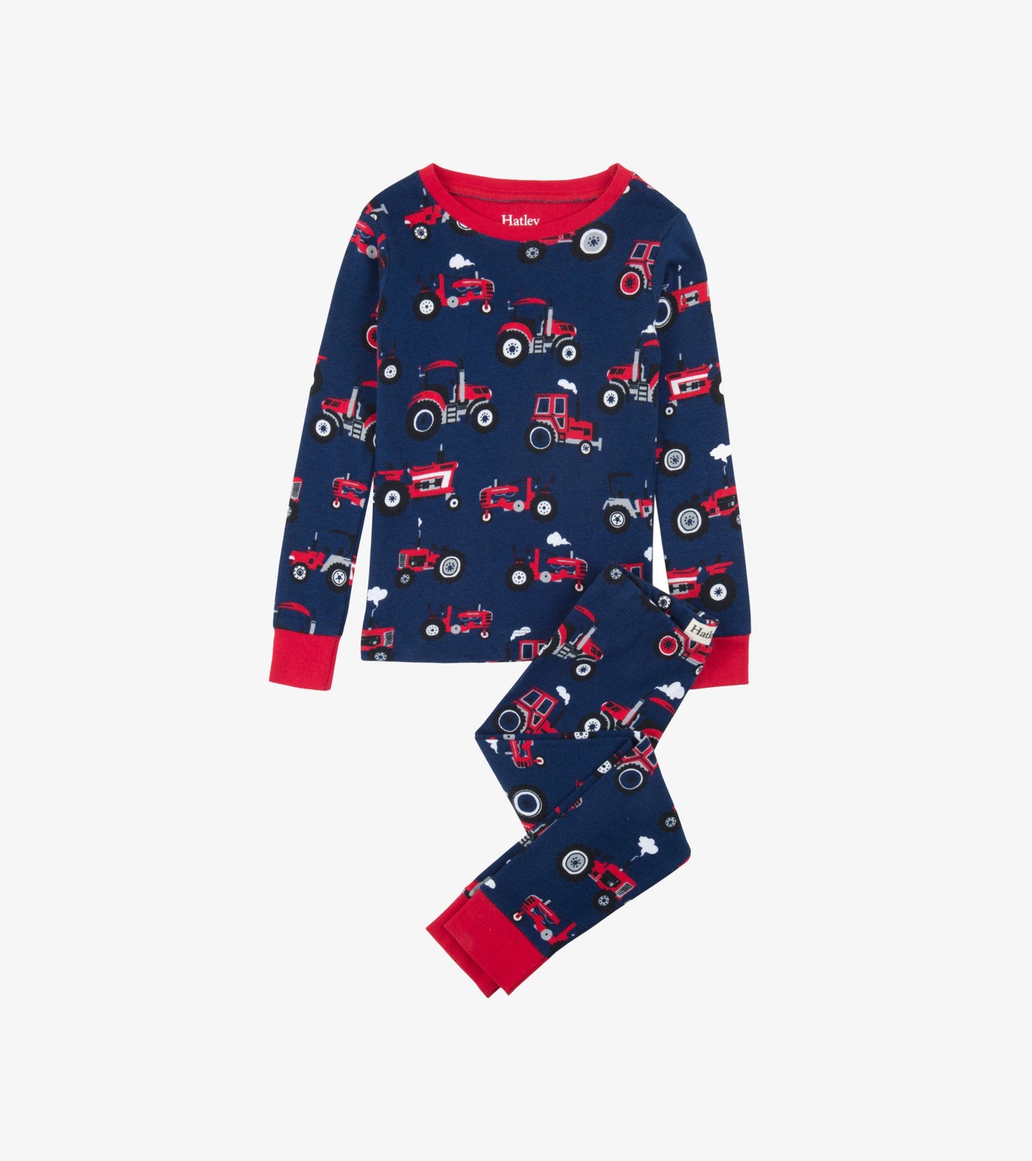 Navy organic cotton pyjama set featuring red tractor patterns, with long sleeves and matching pants.
