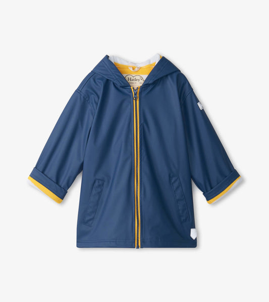 Navy zip-up raincoat for kids with a hood and yellow trim, featuring two front pockets and short sleeves.