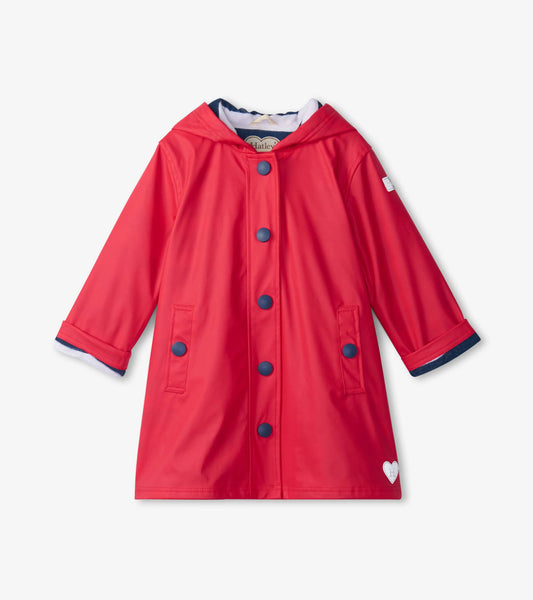 Red and navy button-up raincoat with a hood, featuring blue buttons and two front pockets. Suitable for kids.