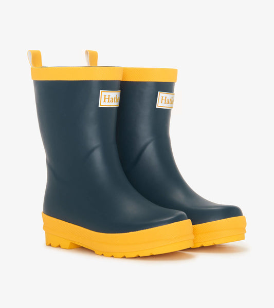 Navy blue and yellow matte wellies with a textured sole and pull tabs for easy wear. Suitable for kids.