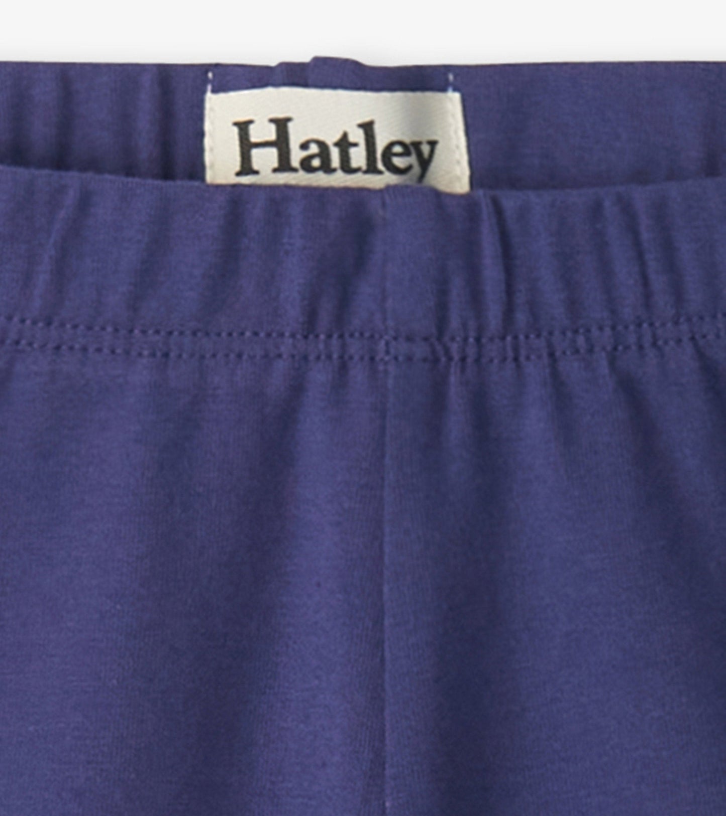 Navy bike shorts with an elastic waistband, made from soft material, suitable for active wear.