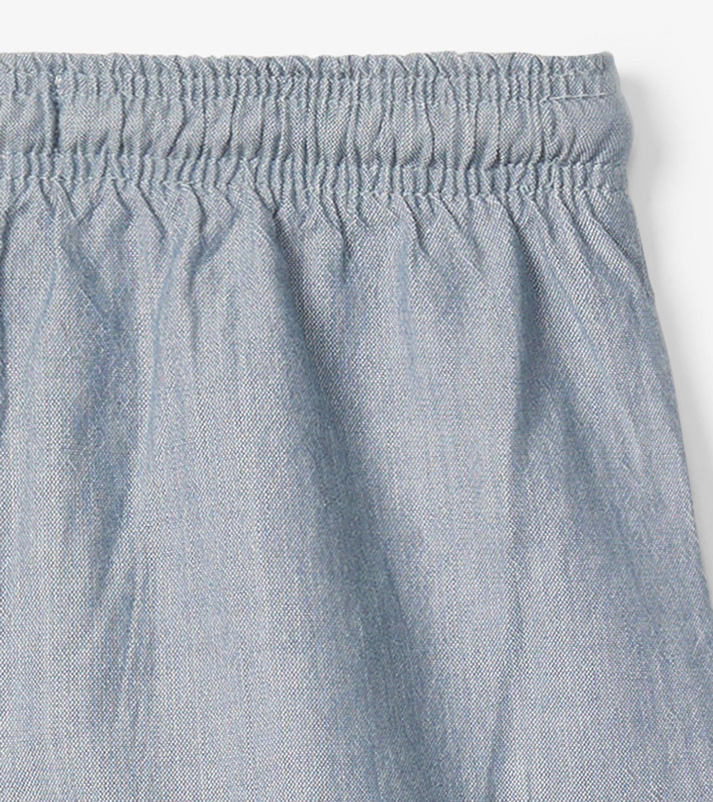 Light blue chambray pull-on shorts with an elastic waistband, suitable for baby and toddler boys.