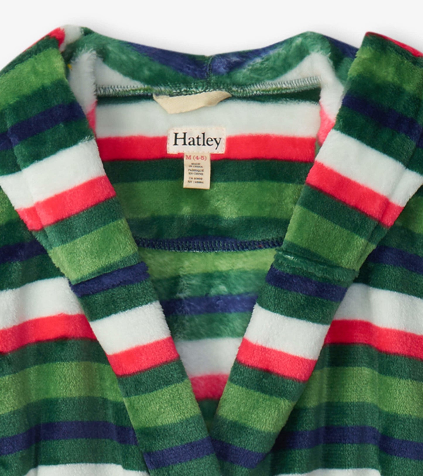 Kids fleece robe featuring colorful holiday stripes in green, red, white, and blue, with a cozy hood and soft texture.