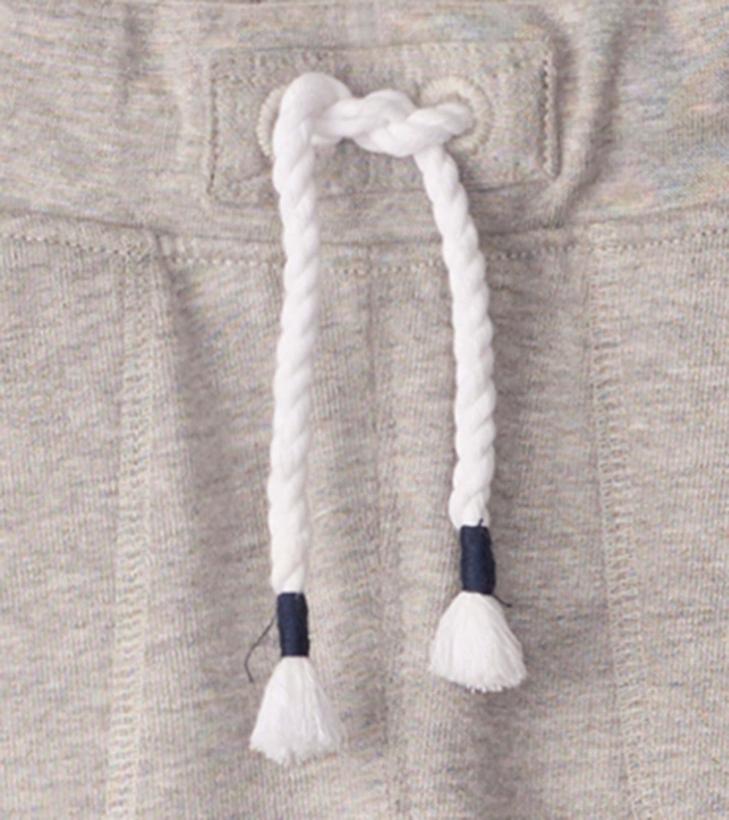 Light grey slim fit joggers with a white drawstring featuring navy accents.