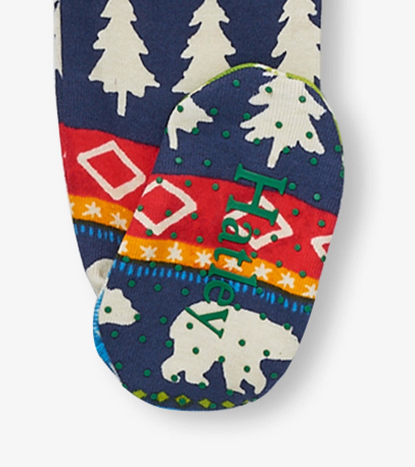 Navy footed sleeper with Fair Isle pattern featuring trees and bears in vibrant colors, suitable for babies.