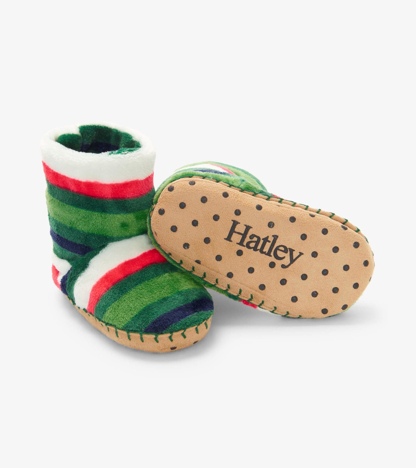 Green fleece kids' slippers with red and white stripes, featuring a soft interior and dotted tan sole.
