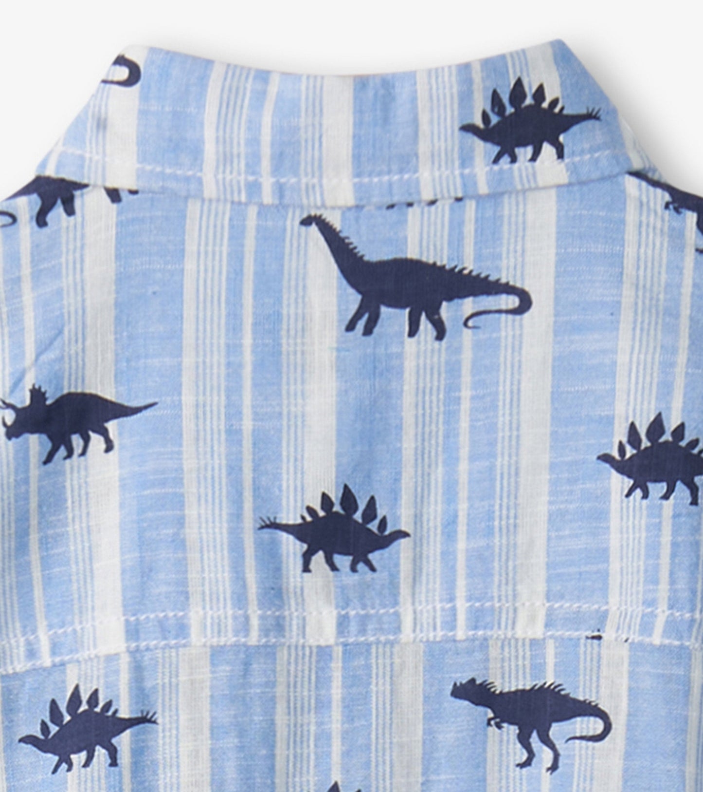 Light blue button-down shirt featuring dark blue dinosaur silhouettes and vertical stripes.