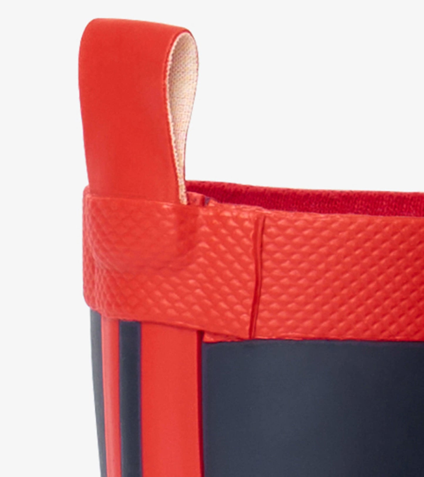 Navy and red matte wellies with a textured finish and a pull tab for easy wear.