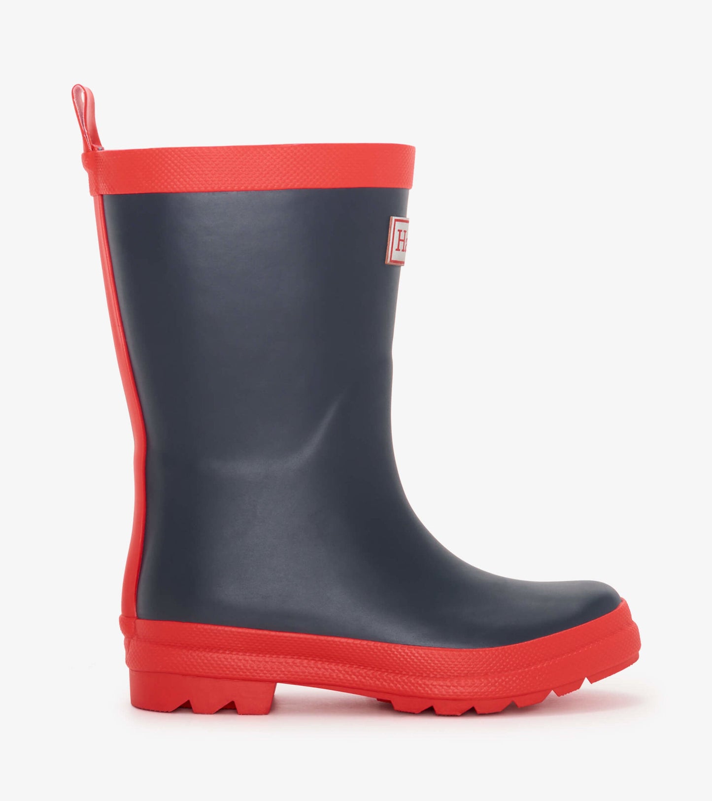 Navy and red matte wellies with a textured sole and pull tab, designed for kids' outdoor wear.