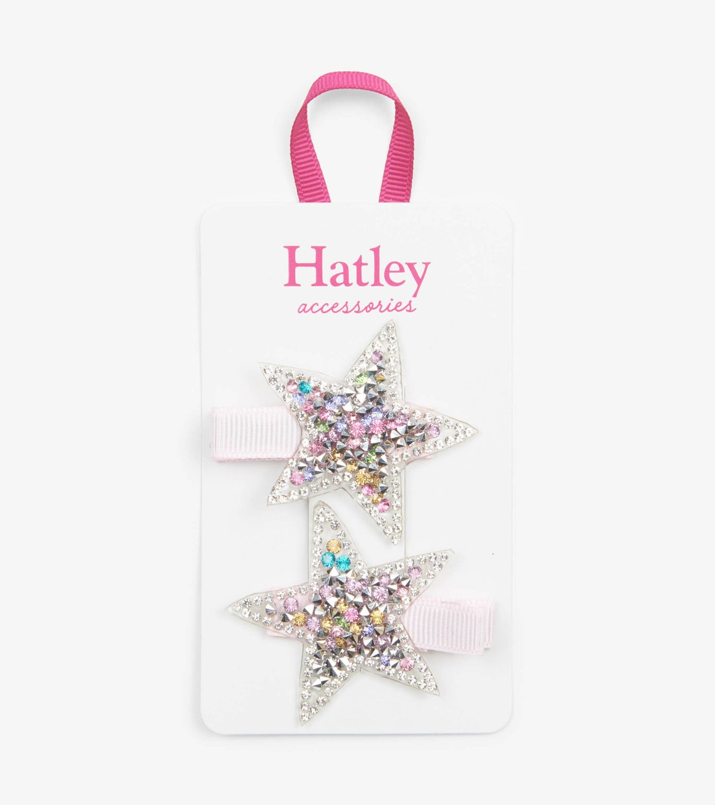 Two star-shaped hair clips adorned with colorful rhinestones on a pink ribbon.