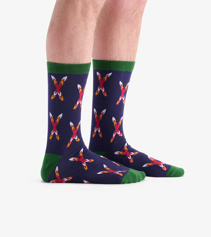 Navy socks with a crossed skis pattern in red and white, featuring green cuffs and soles, suitable for casual wear.