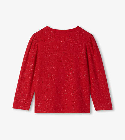 Back view of a red long sleeve tee with silver speckles and puff shoulders
