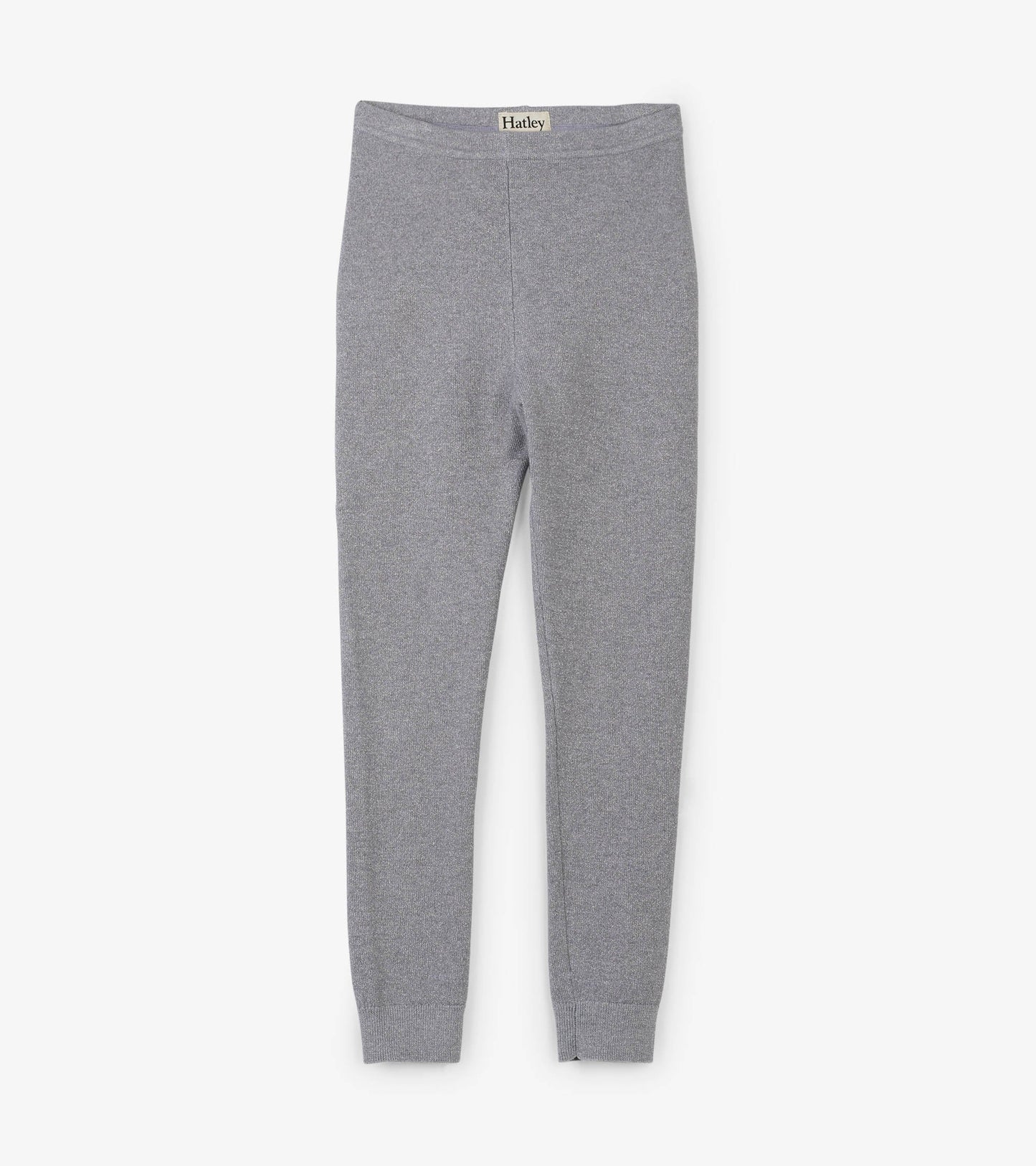 Silver shimmer cable knit leggings with a fitted design, featuring a soft waistband and tapered ankles.