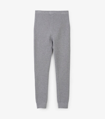 Silver shimmer cable knit leggings with a snug fit and elastic waistband, suitable for girls.