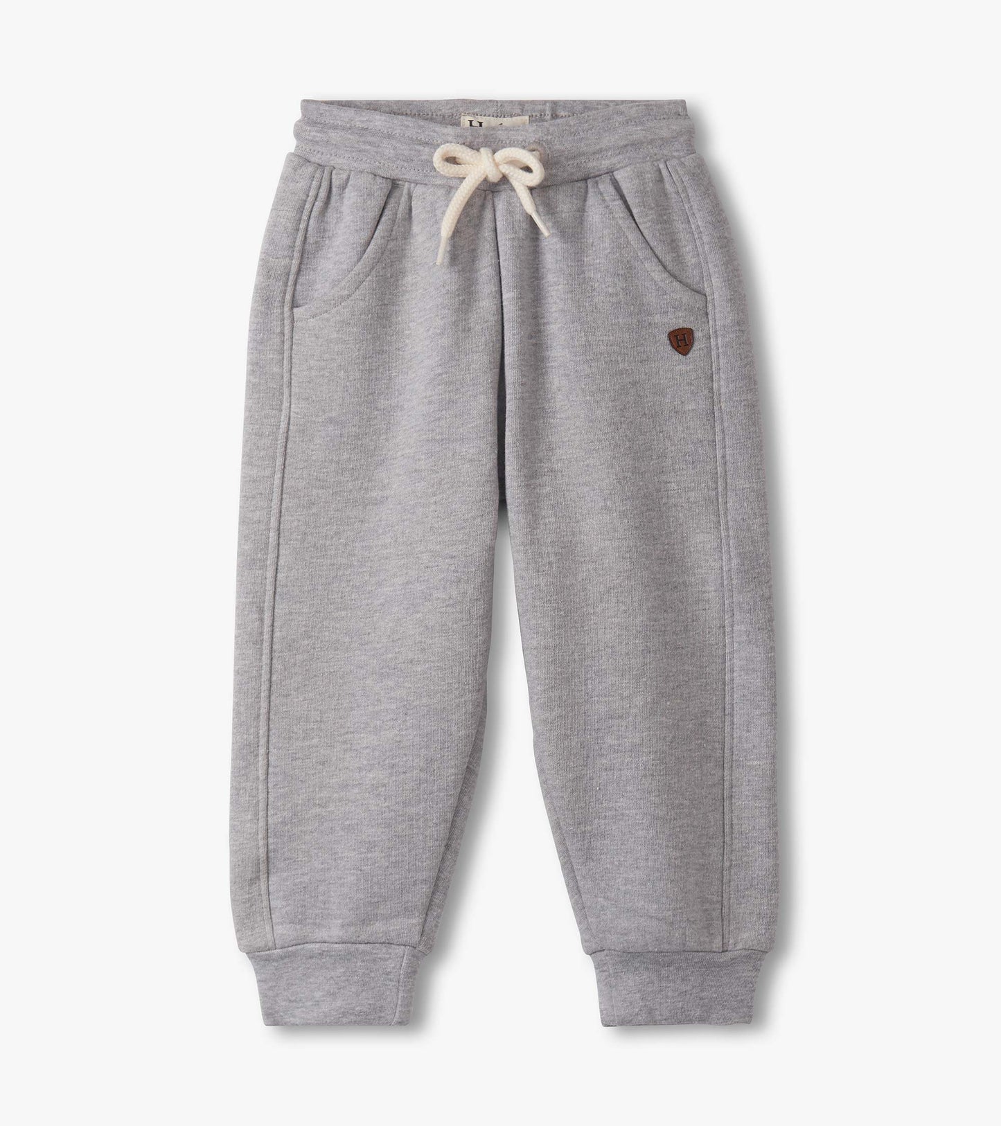 Grey athletic track pants for baby and toddler boys, featuring an elastic waistband and side pockets.