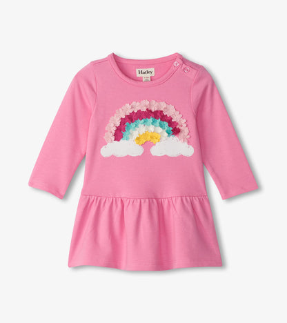 Pink long-sleeve toddler dress with rainbow and cloud floral applique, front view