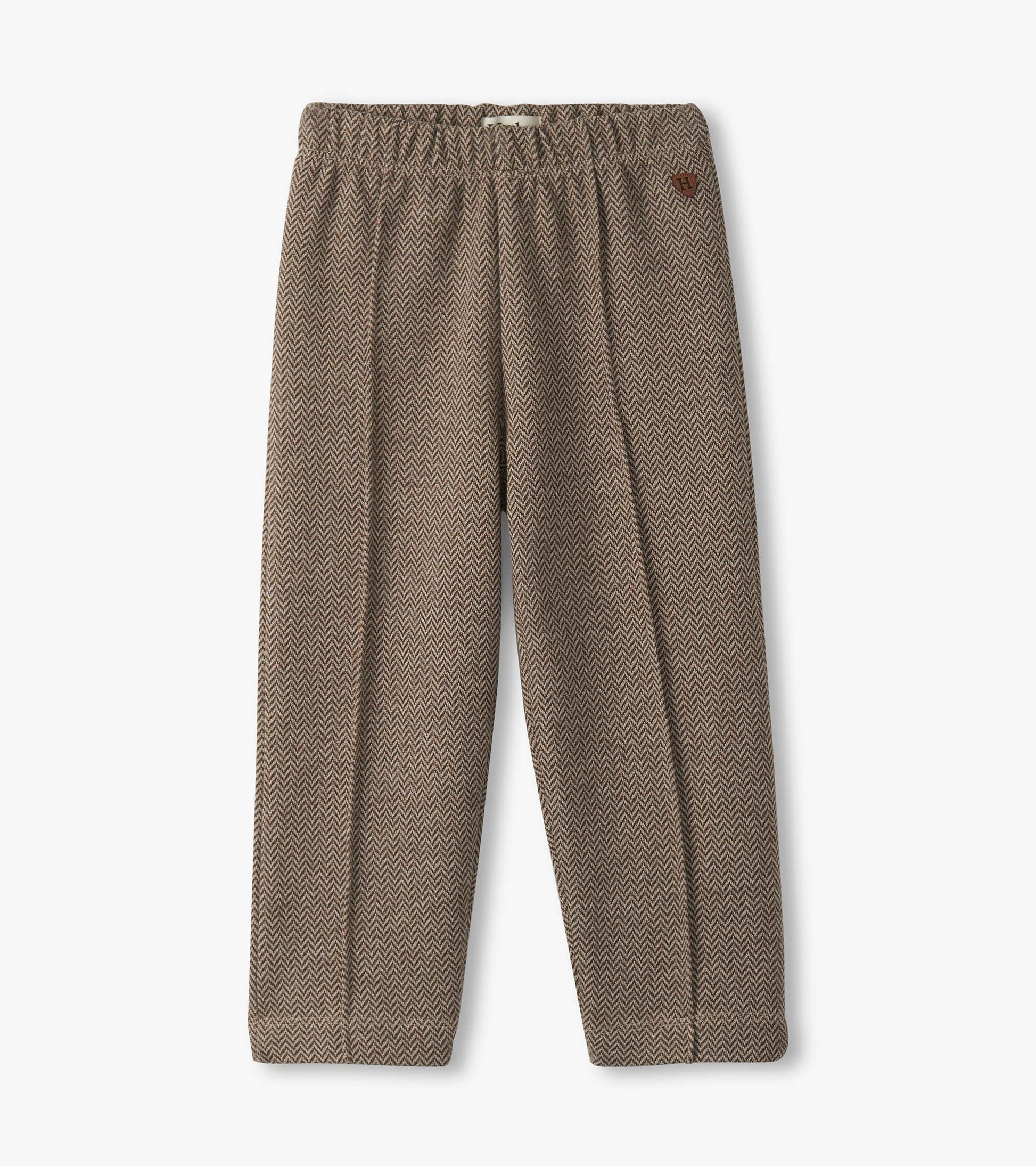 Brown herringbone pants for baby and toddler boys with an elastic waistband and a relaxed fit.