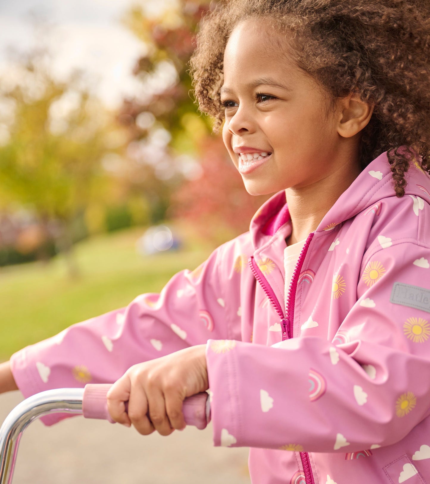 Girls Sun Charms Zip-Up Rain Jacket