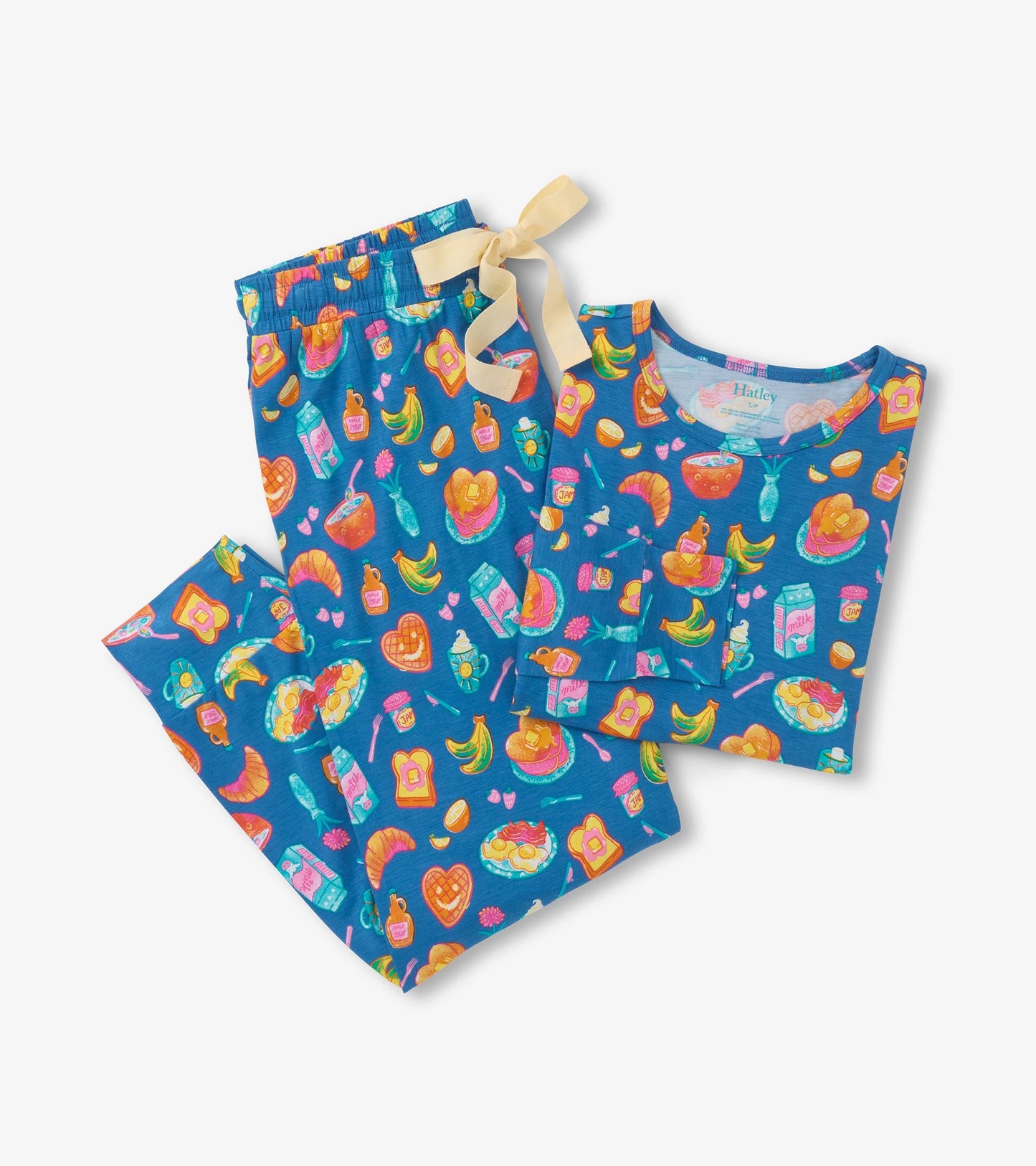 Blue bamboo pajama set featuring a colorful breakfast-themed print with a short-sleeve top and elastic-waist pants.