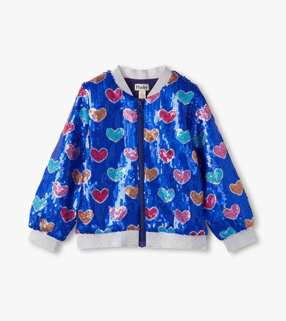 Blue bomber jacket covered in colorful heart-shaped sequins, featuring a front zipper and ribbed cuffs.