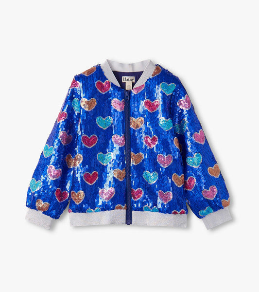 Blue bomber jacket covered in colorful heart-shaped sequins, featuring a front zipper and ribbed cuffs.