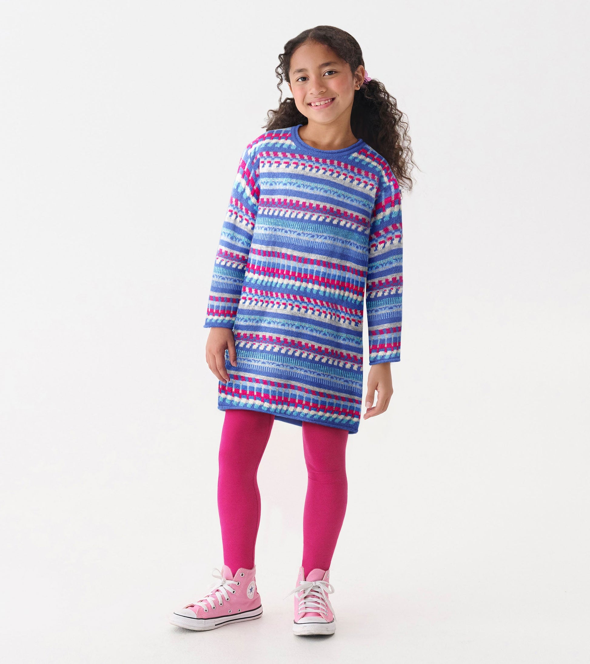 Blueberry striped sweater dress with long sleeves, paired with pink leggings and sneakers, suitable for casual wear.