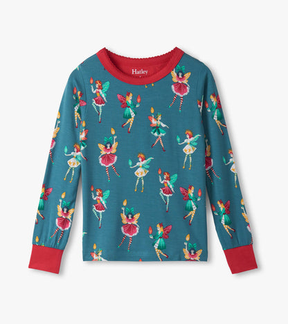 Teal long-sleeve pyjama top featuring colorful fairy illustrations and a red neckline and cuffs.