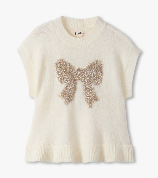 Cream sweater vest featuring a sparkly gold bow design on the front and a ribbed hem. Short sleeves and relaxed fit.